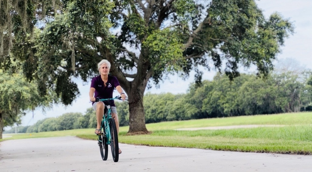 County Commissioner Cheryl Grieb (D4) utilizes the newly opened segment of the County's Master Trail Network Plan.