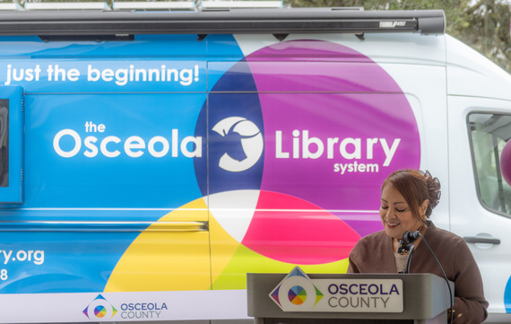 D2 Commissioner Viviana Janer provides remarks at the ribbon cutting for the Mobile Library Unit.