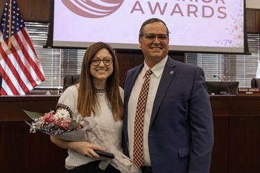 Kelly Trace and District 5 Commissioner Ricky Booth at the Woman Warrior Ceremony.