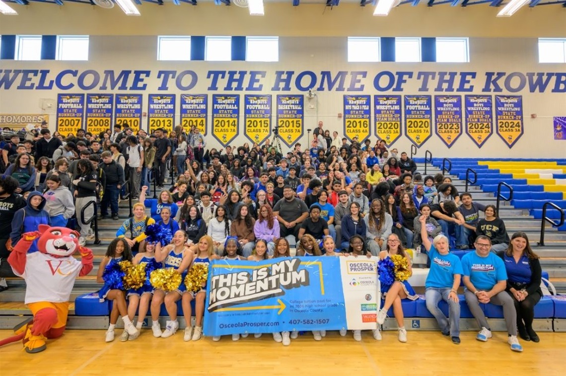 Osceola County Vice Chairwoman and D4 Commissioner Cheryl Grieb, School District of Osceola County Superintendent Dr. Mark Shanoff, Valencia College's Purrcy the VC Puma, and Osceola High School students at the 2026 Osceola Prosper Program Announcement.