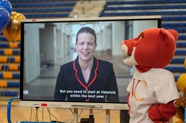 Valencia College President Dr. Kathleen Plinske addresses Osceola High School students via video at the 2026 Osceola Prosper Program Announcement.
