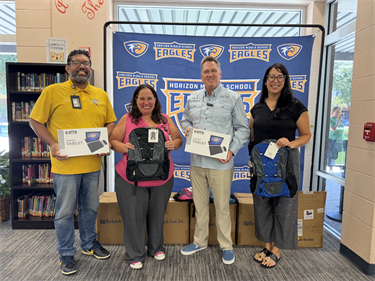 Horizon Middle School with Principal Megan Gould, Assistant Principal Andrea Wold, and faculty staff member Erick Estrada