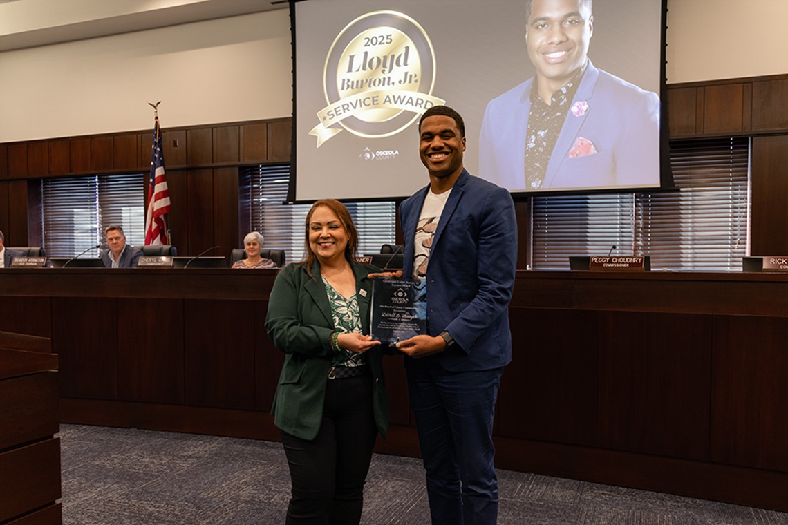 Osceola County Commissioner Chairwoman Viviana Janer presented the Lieutenant Lloyd Burton Jr. Service Award to LaVell D. Monger for his leadership and community impact.