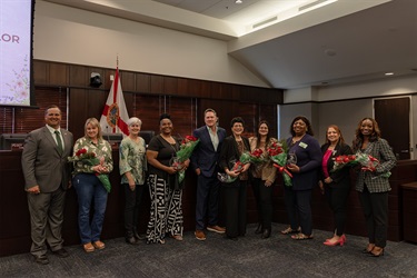 From left to right: Ricky Booth, Deana Johnson Taylor, Cheryl Grieb, Pastor Tamika Holley, Brandon Arrington, Marilyn Cortes-Lovato, Peggy Choudhry, Arabella Weaver, Viviana Janer, and Judge Gabrielle Sanders-Morency