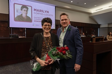 Marilyn Cortes-Lovato and Commissioner Brandon Arrington of District 3