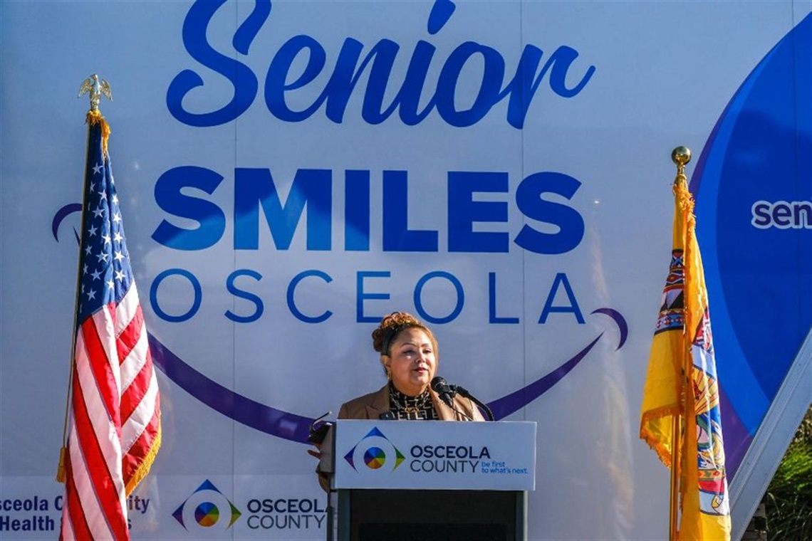 Commissioner Viviana Janer speaks at ribbon-cutting. Mobile Denture Unit Brings Affordable Senior Smiles to Osceola County