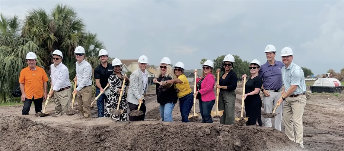 Osceola County District 2 Commissioner & Chairwoman Viviana Janer (fourth from R) is joined by Osceola Council on Aging CEO Wendy Ford (sixth from R), U.S. Congressman Darren Soto (FL-9) (sixth from L) and others to break ground on Buen Vecino.